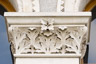 Carved floral capital at windows